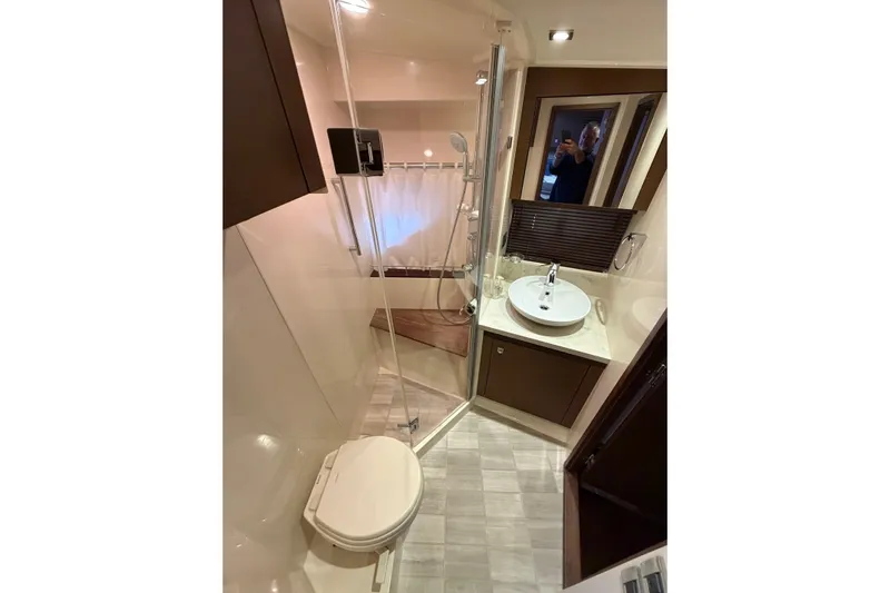 Livin Da Lyfe Yacht Photos Pics Luxurious bathroom in 2013 Sea Ray 510 Sundancer yacht with modern fixtures and elegant design.