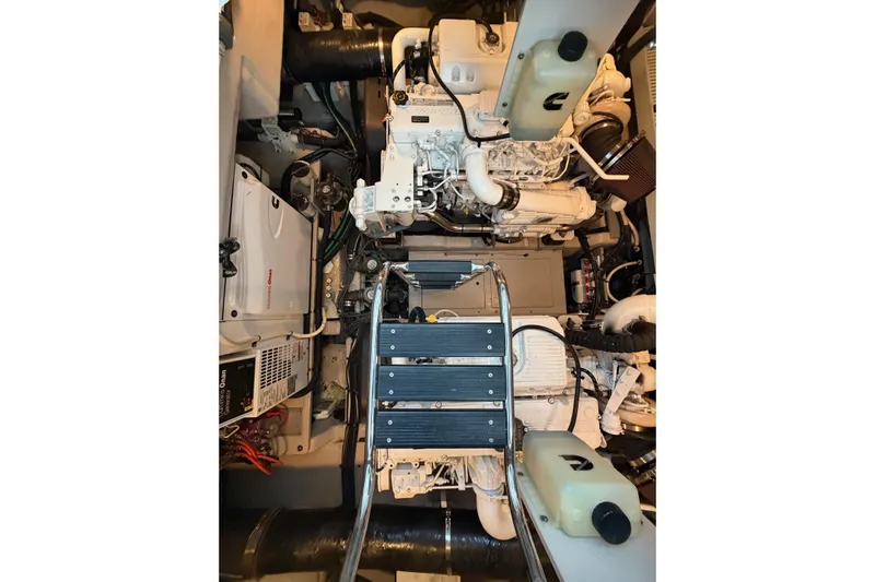 Livin Da Lyfe Yacht Photos Pics Engine room of 2013 Sea Ray 510 Sundancer with visible machinery and components.