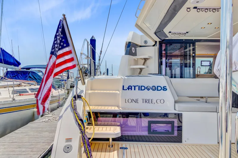 Latidoods Yacht Photos Pics Leopard 42 yacht docked, displaying American flag, Lone Tree, CO.