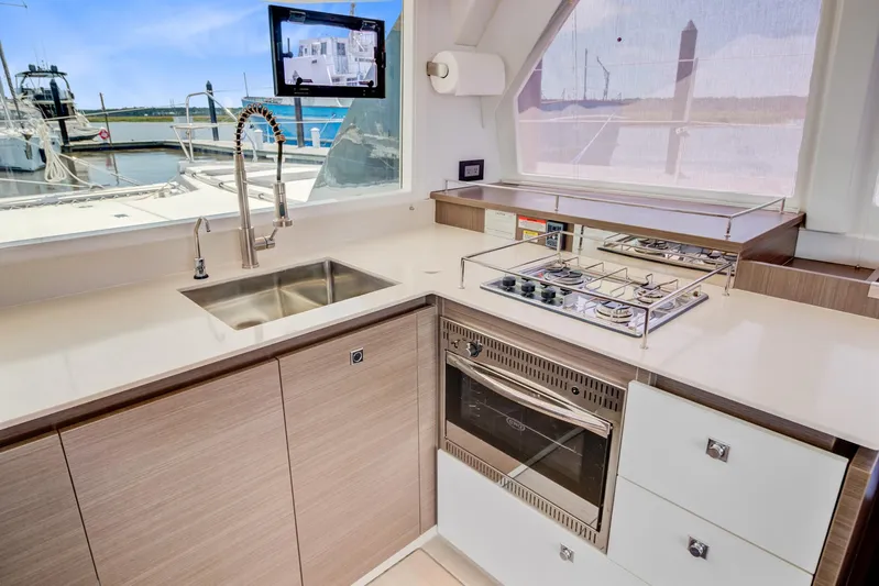 Latidoods Yacht Photos Pics Modern kitchen in 2021 Leopard 42 yacht with stove, oven, and sink.