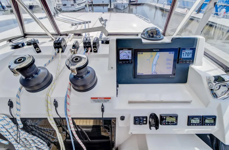 Latidoods Yacht Photos Pics Helm of 2021 Leopard 42 catamaran with navigation equipment and winches.