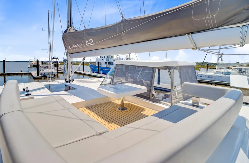 Latidoods Yacht Photos Pics 2021 Leopard 42 catamaran with spacious deck and modern design at marina.