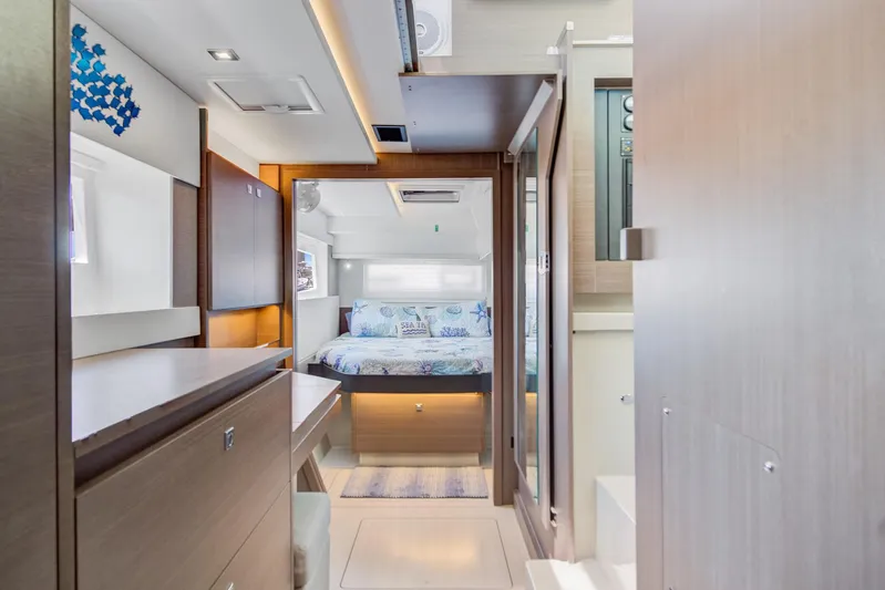 Latidoods Yacht Photos Pics Luxurious interior of 2021 Leopard 42 yacht with modern bedroom and sleek design.