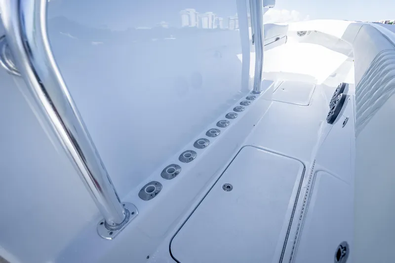  Yacht Photos Pics 2027 Billfish 39 boat interior with sleek white deck and chrome railings.