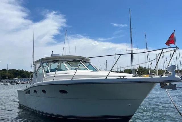 Moxie Yacht Photos Pics 1998 Tiara Yachts 3500 Open boat on water, clear sky background.