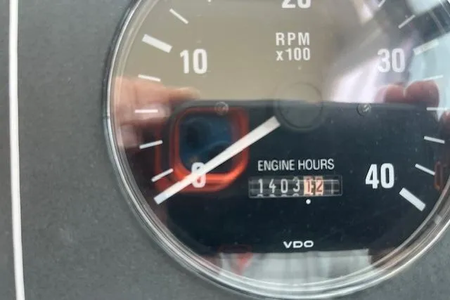 Moxie Yacht Photos Pics Close-up of Tiara Yachts 3500 Open 1998 tachometer showing 1403 engine hours.