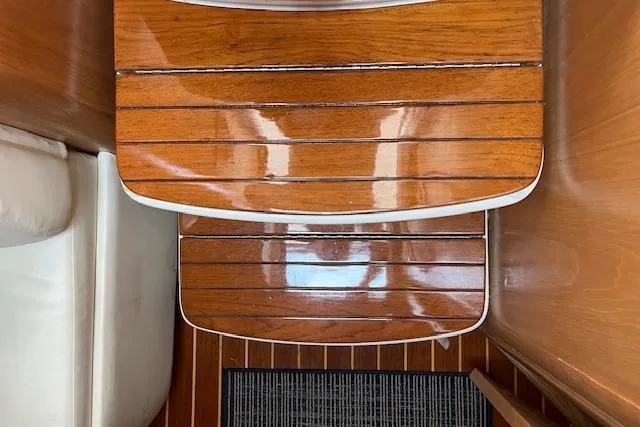 Moxie Yacht Photos Pics Polished wooden steps inside a 1998 Tiara Yachts 3500 Open.