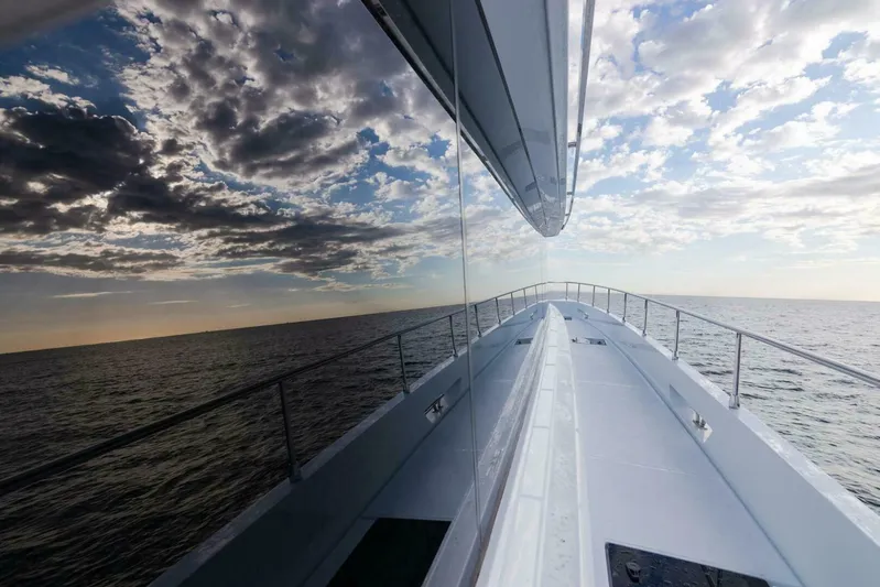 53s Iliad 2026 Yacht Photos Pics Luxurious ILIAD 53S yacht cruising on open sea under dramatic sky, 2026 model.