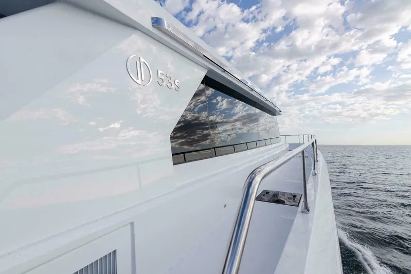 53s Iliad 2026 Yacht Photos Pics Luxury ILIAD 53S yacht cruising on open sea under a cloudy sky, 2026 model.