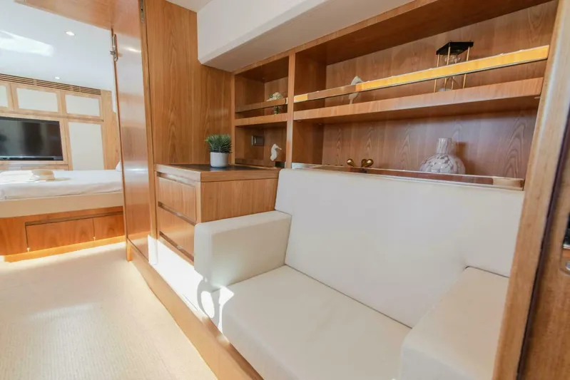 53s Iliad 2026 Yacht Photos Pics Luxurious interior of ILIAD 53S yacht, featuring elegant wood finishes and modern furnishings, 2026 model.