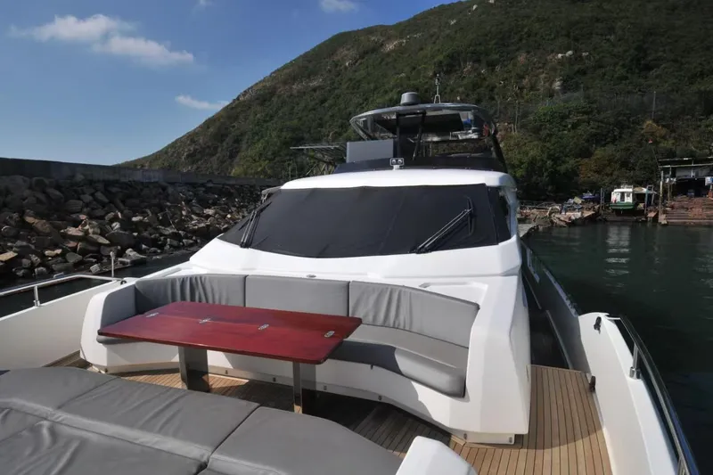  Yacht Photos Pics Luxurious 2017 Ferretti Yachts 850 with elegant outdoor seating and scenic backdrop.