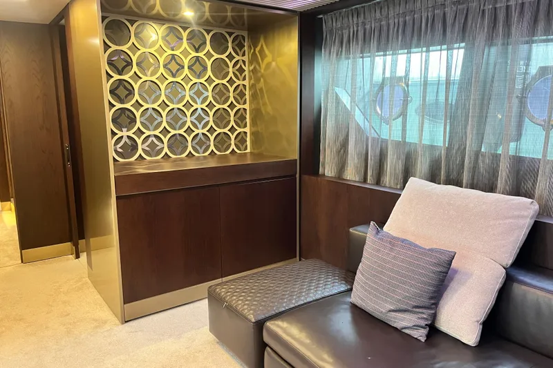  Yacht Photos Pics Luxurious interior of 2017 Ferretti Yachts 850 with elegant seating and decorative paneling.