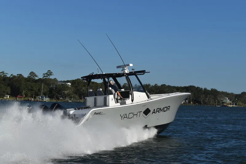 Main Event Yacht Photos Pics 2023 Front Runner 39 Center Console boat cruising on a lake with Yacht Armor branding.