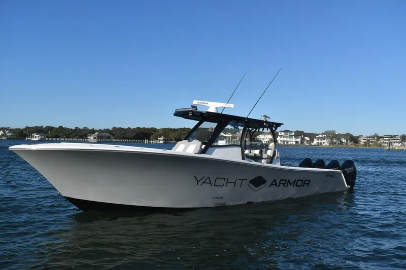 Main Event Yacht Photos Pics 2023 Front Runner 39 Center Console boat on water, clear sky background.