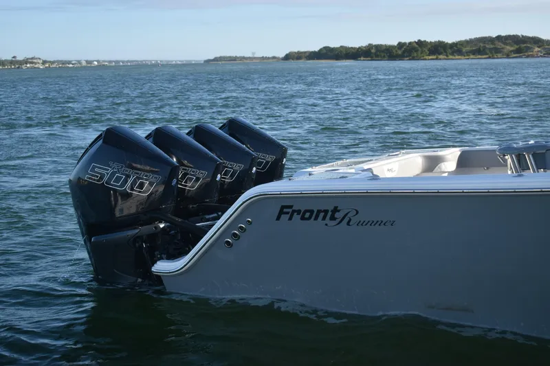 Main Event Yacht Photos Pics 2023 Front Runner 39 Center Console boat with four powerful outboard engines on the water.