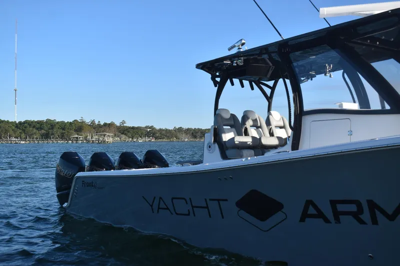 Main Event Yacht Photos Pics 2023 Front Runner 39 Center Console boat on water, featuring sleek design and multiple engines.