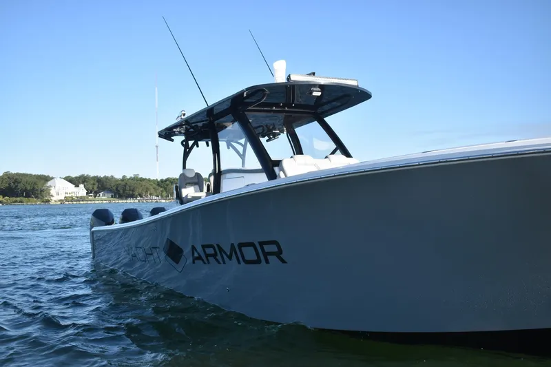 Main Event Yacht Photos Pics 2023 Front Runner 39 Center Console boat on water, featuring sleek design and "ARMOR" branding.