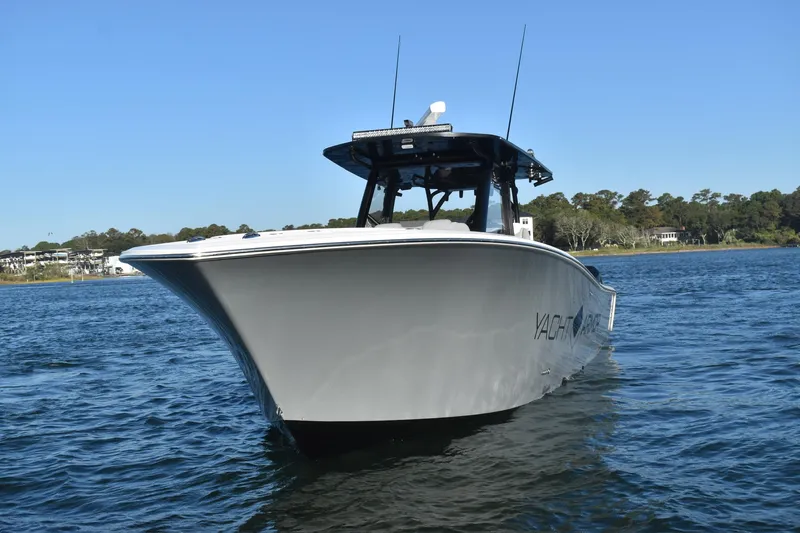 Main Event Yacht Photos Pics 2023 Front Runner 39 Center Console boat on water, clear sky background.