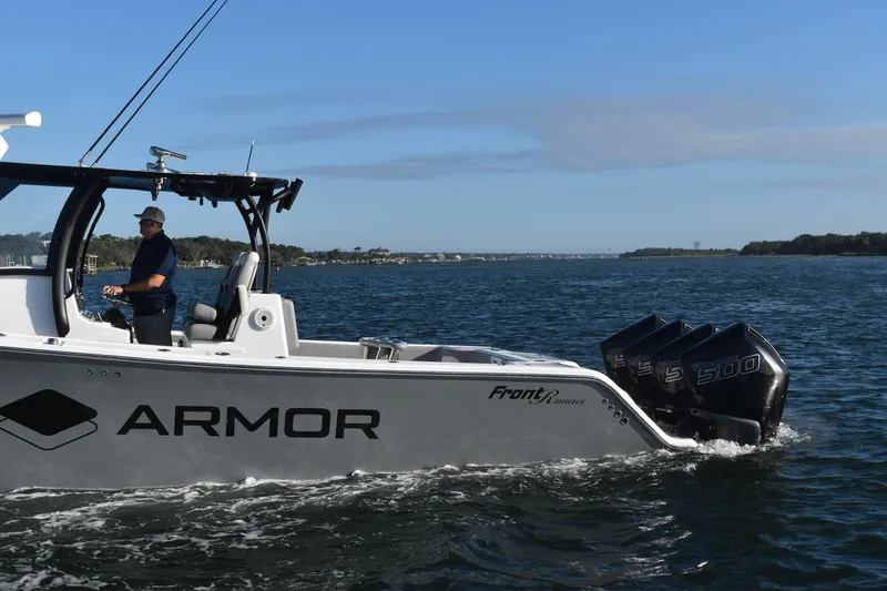 Main Event Yacht Photos Pics 2023 Front Runner 39 Center Console boat cruising on open water.