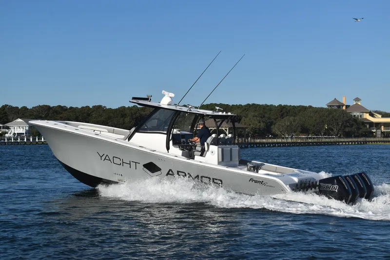 Main Event Yacht Photos Pics 2023 Front Runner 39 Center Console boat cruising on water.