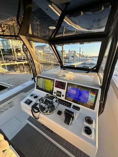 Main Event Yacht Photos Pics 2023 Front Runner 39 Center Console boat dashboard with advanced navigation systems.