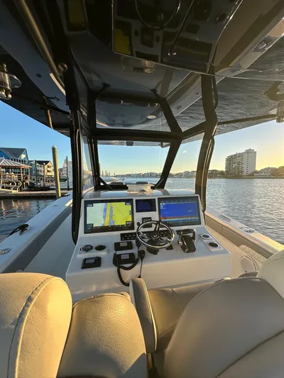 Main Event Yacht Photos Pics 2023 Front Runner 39 Center Console boat interior with advanced navigation system.
