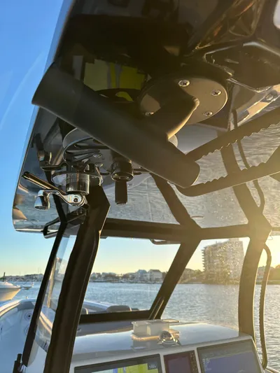 Main Event Yacht Photos Pics 2023 Front Runner 39 Center Console boat helm with sunset view.