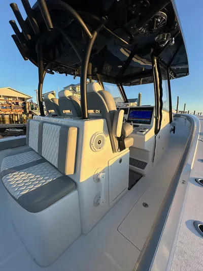 Main Event Yacht Photos Pics 2023 Front Runner 39 Center Console boat with sleek seating and modern dashboard.