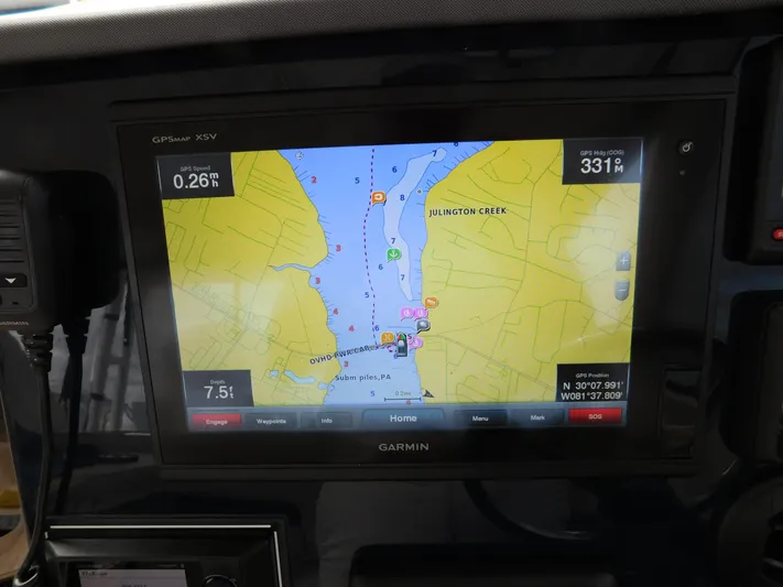  Yacht Photos Pics Garmin GPS display on 2018 Pursuit OS 325 Offshore, showing navigation map and coordinates.