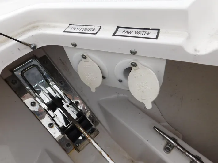  Yacht Photos Pics 2018 Pursuit OS 325 Offshore boat water connections labeled fresh and raw.