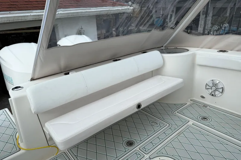 Yacht Photos Pics 2019 Robalo R300 Center Console boat interior with white seating and deck.