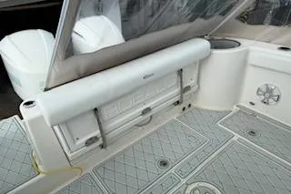  Yacht Photos Pics 2021 Robalo R300 Center Console boat interior with seating and storage.