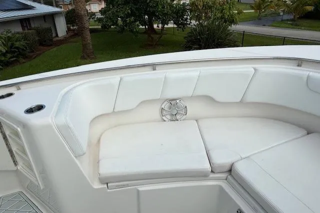  Yacht Photos Pics 2021 Robalo R300 Center Console boat with white cushioned seating area.