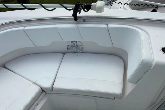  Yacht Photos Pics 2021 Robalo R300 Center Console boat with white cushioned seating area.