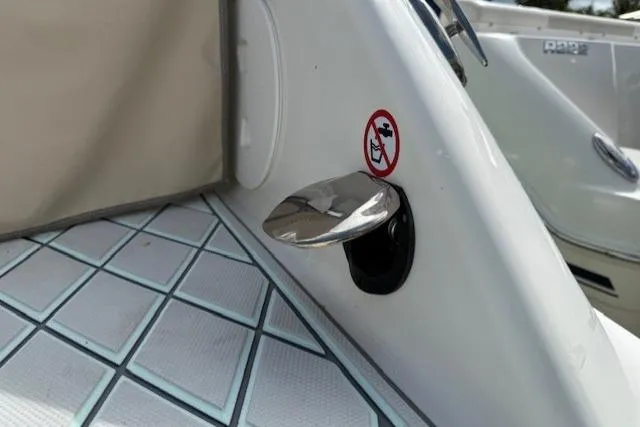  Yacht Photos Pics 2021 Robalo R300 Center Console boat detail with no-step warning sign.