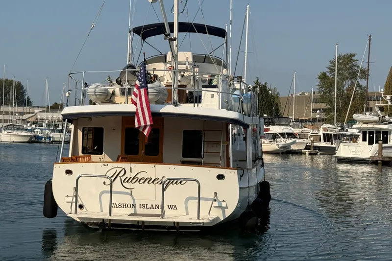  Yacht Photos Pics Kadey-Krogen 48' Northsea Widebody Pilothouse, 1998, docked with American flag, Vashon Island, WA.
