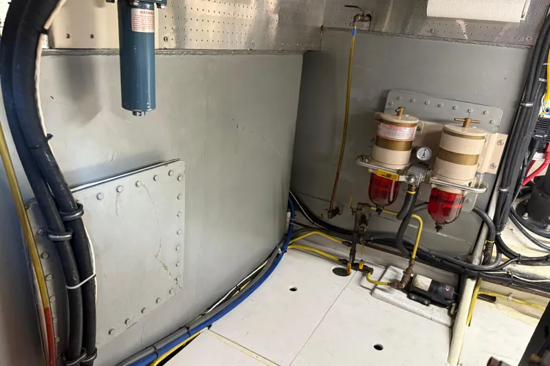  Yacht Photos Pics Engine room of 1998 Kadey-Krogen 48' Northsea Widebody Pilothouse with fuel filters and wiring.