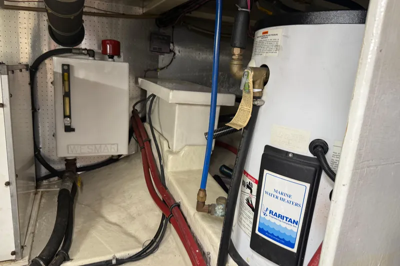  Yacht Photos Pics Engine room of 1998 Kadey-Krogen 48' Northsea with marine water heater and equipment.