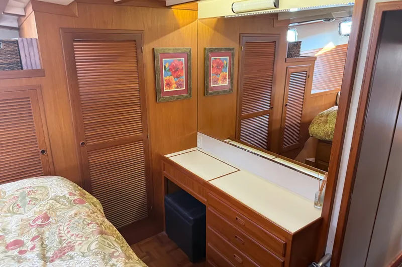  Yacht Photos Pics 1998 Kadey-Krogen 48' Northsea Widebody Pilothouse interior with wood paneling and floral decor.
