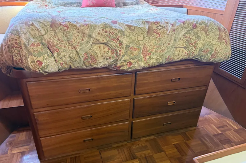  Yacht Photos Pics Wooden storage drawers under bed in 1998 Kadey-Krogen 48' Northsea Widebody Pilothouse.