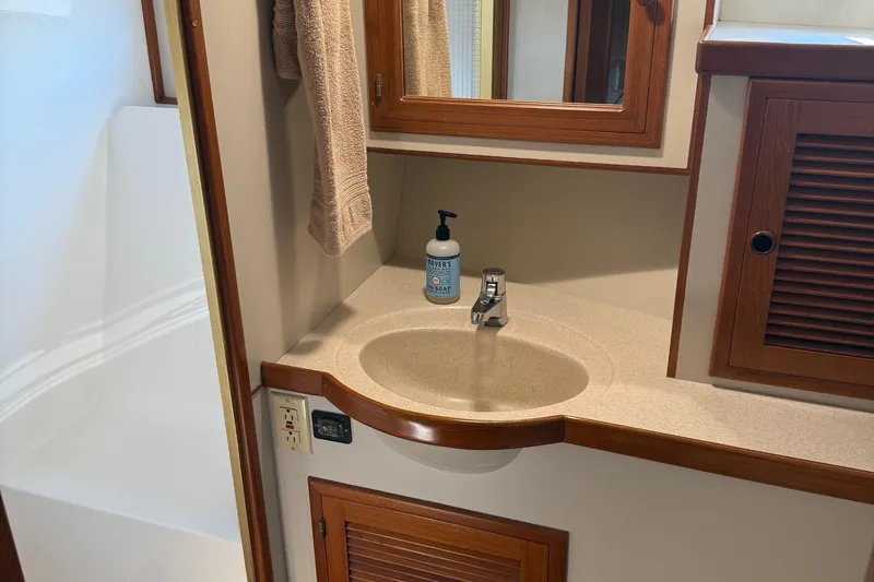  Yacht Photos Pics Bathroom sink area in 1998 Kadey-Krogen 48' Northsea Widebody Pilothouse yacht.