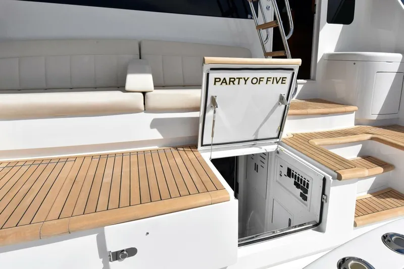 Party Of Five Yacht Photos Pics 2019 Viking 80 Sky Bridge yacht with teak deck and "Party of Five" hatch.