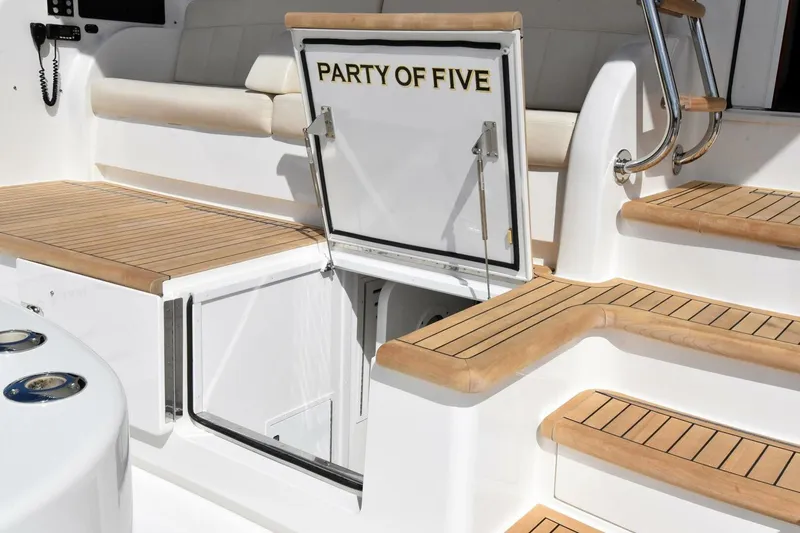 Party Of Five Yacht Photos Pics 2019 Viking 80 Sky Bridge yacht with teak steps and "Party of Five" hatch.