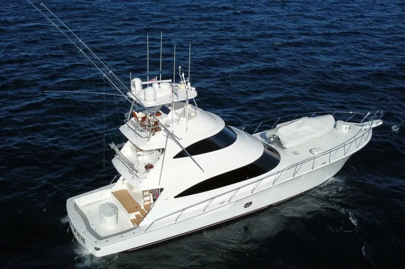 Party Of Five Yacht Photos Pics 2019 Viking 80 Sky Bridge yacht cruising on open sea.