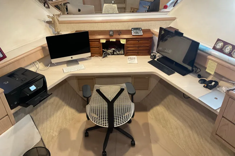 Moon River Yacht Photos Pics Office setup on 1997 Hatteras 70 Sport Deck Motor Yacht with dual monitors and printer.