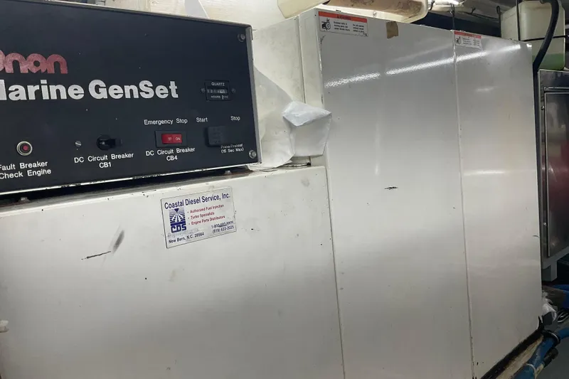 Moon River Yacht Photos Pics Marine generator system on a 1997 Hatteras 70 Sport Deck Motor Yacht.