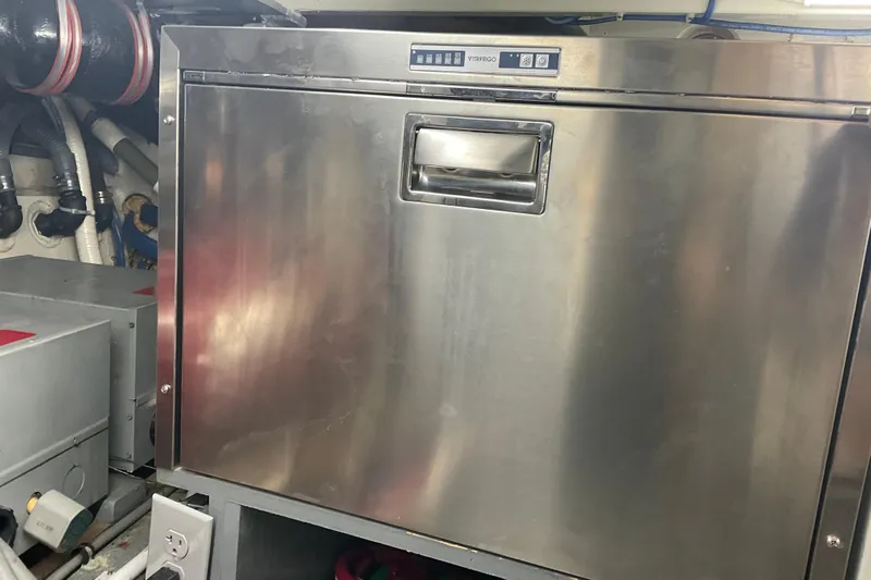 Moon River Yacht Photos Pics Stainless steel appliance in 1997 Hatteras 70 Sport Deck Motor Yacht engine room.