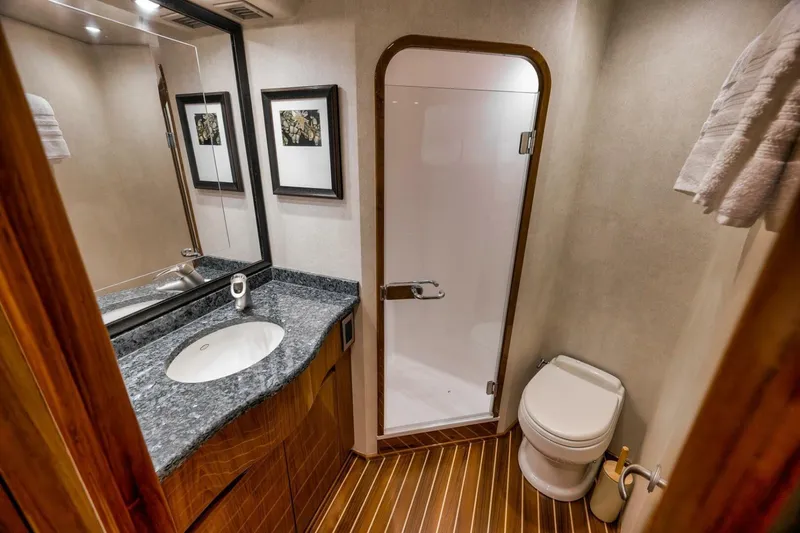  Yacht Photos Pics 2011 Viking 76 Enclosed Bridge- TEUSEAS- Forward VIP Head