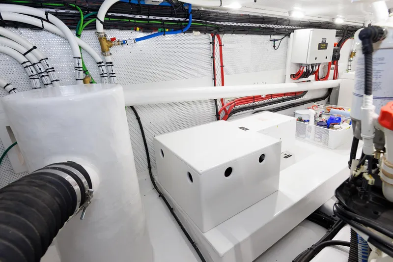 Mona Lisa Yacht Photos Pics Engine room of 2025 Vicem 58 Classic yacht with organized cables and equipment.