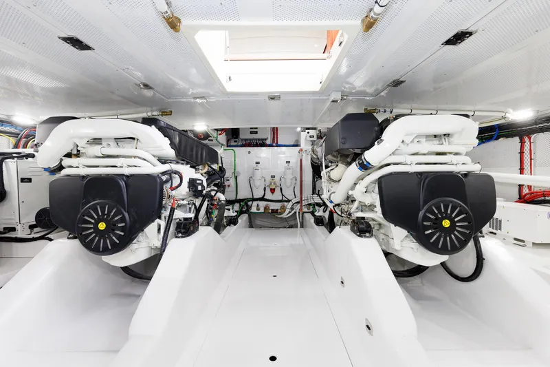 Mona Lisa Yacht Photos Pics Engine room of 2025 Vicem 58 Classic yacht, showcasing dual engines and modern equipment.